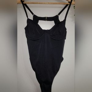 Extra large black victoria's secret bathing suit.